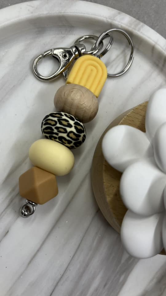 Yellow arch with leopard print keychain