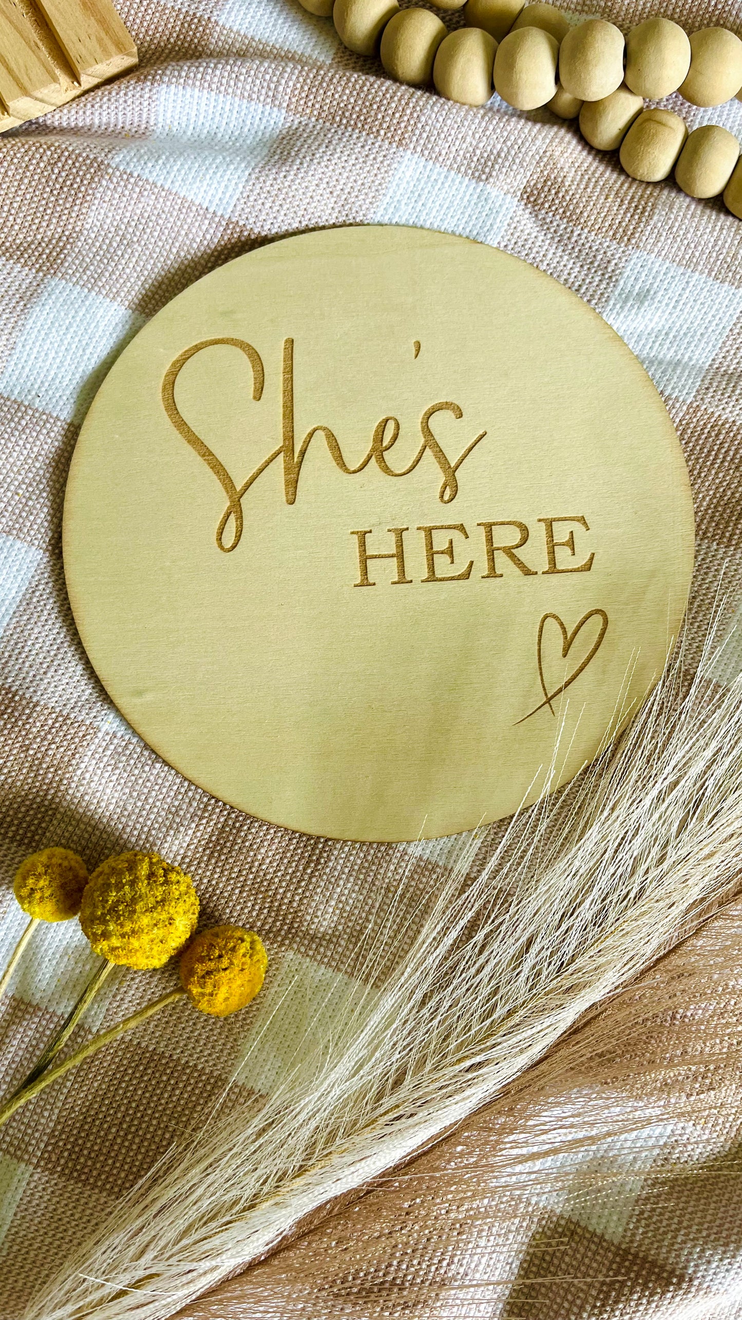 She's here/ he's here round announcement plaque
