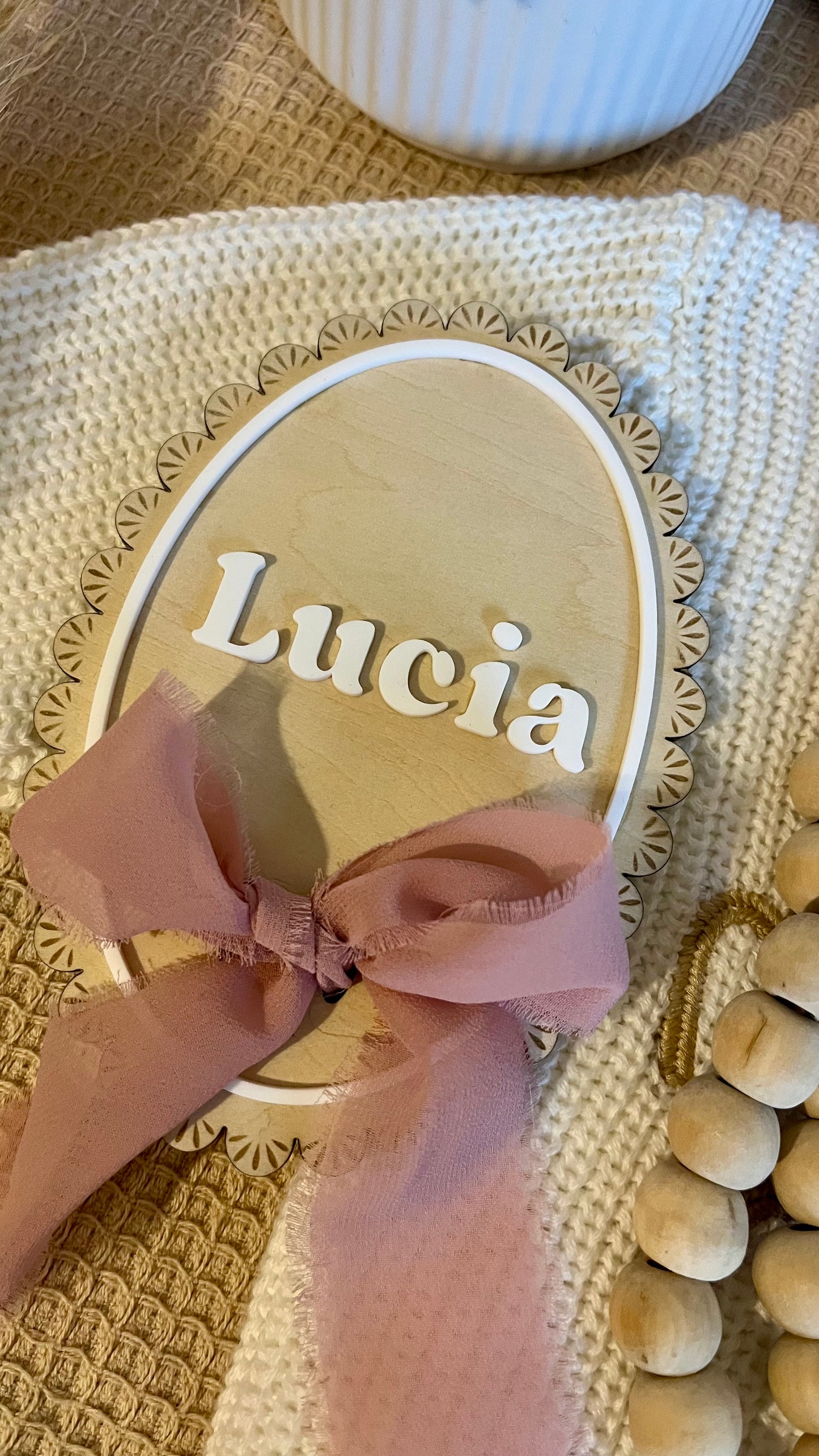 Laced oval birth announcement