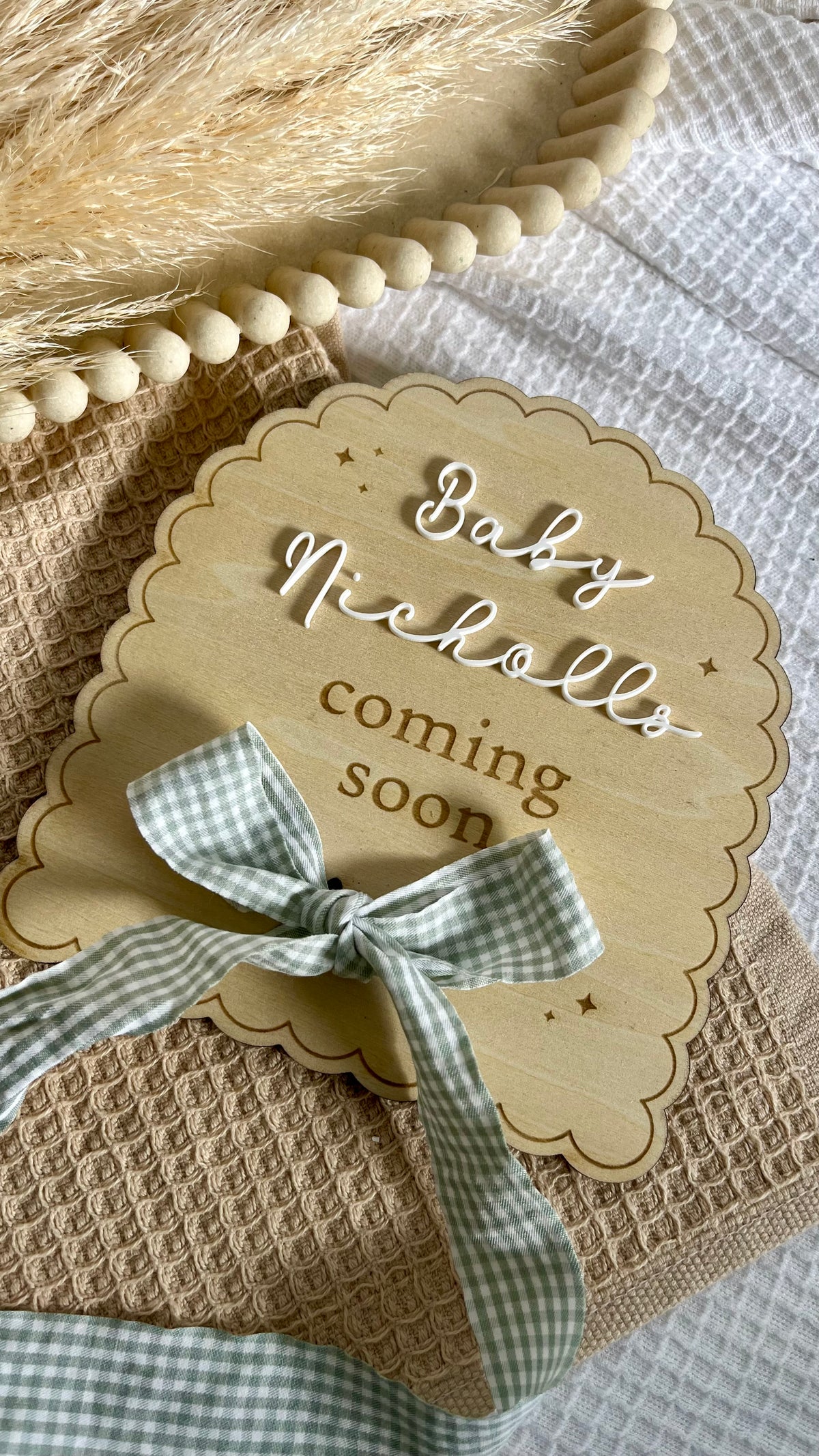 Scallop arch ribbon pregnancy announcement