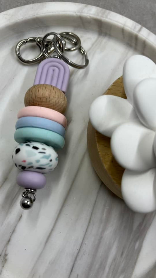 Purple speckle arch keychain