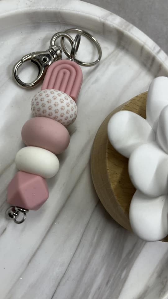 Pink/ paw print arch keychain