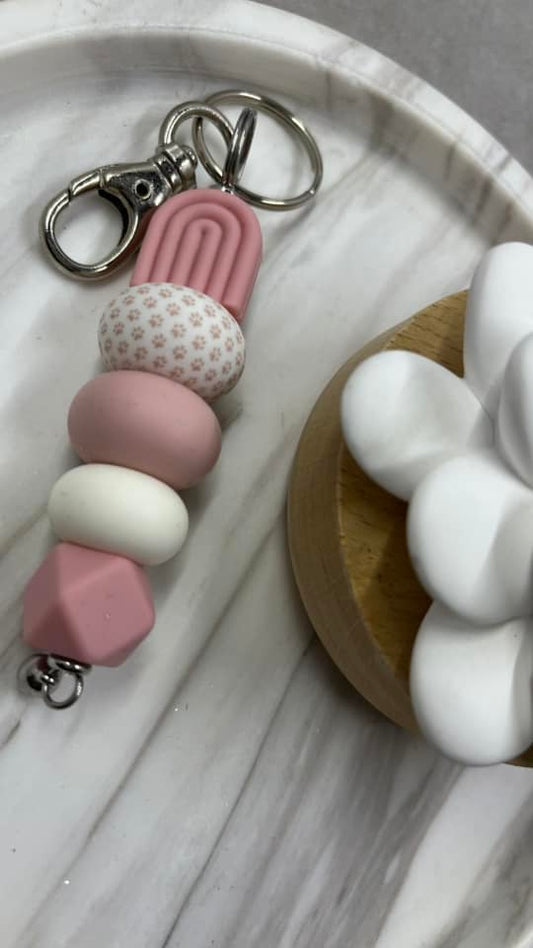 Pink/ paw print arch keychain