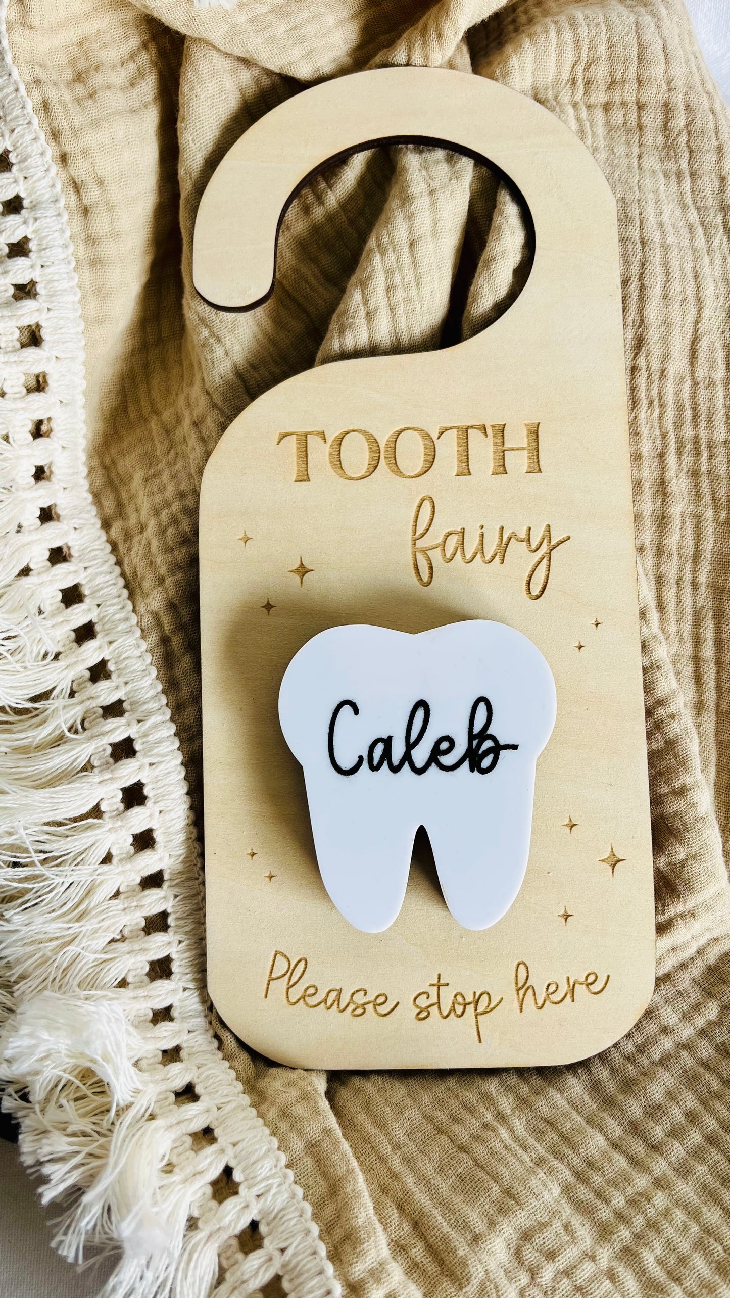 Tooth fairy door hanger with a drop box