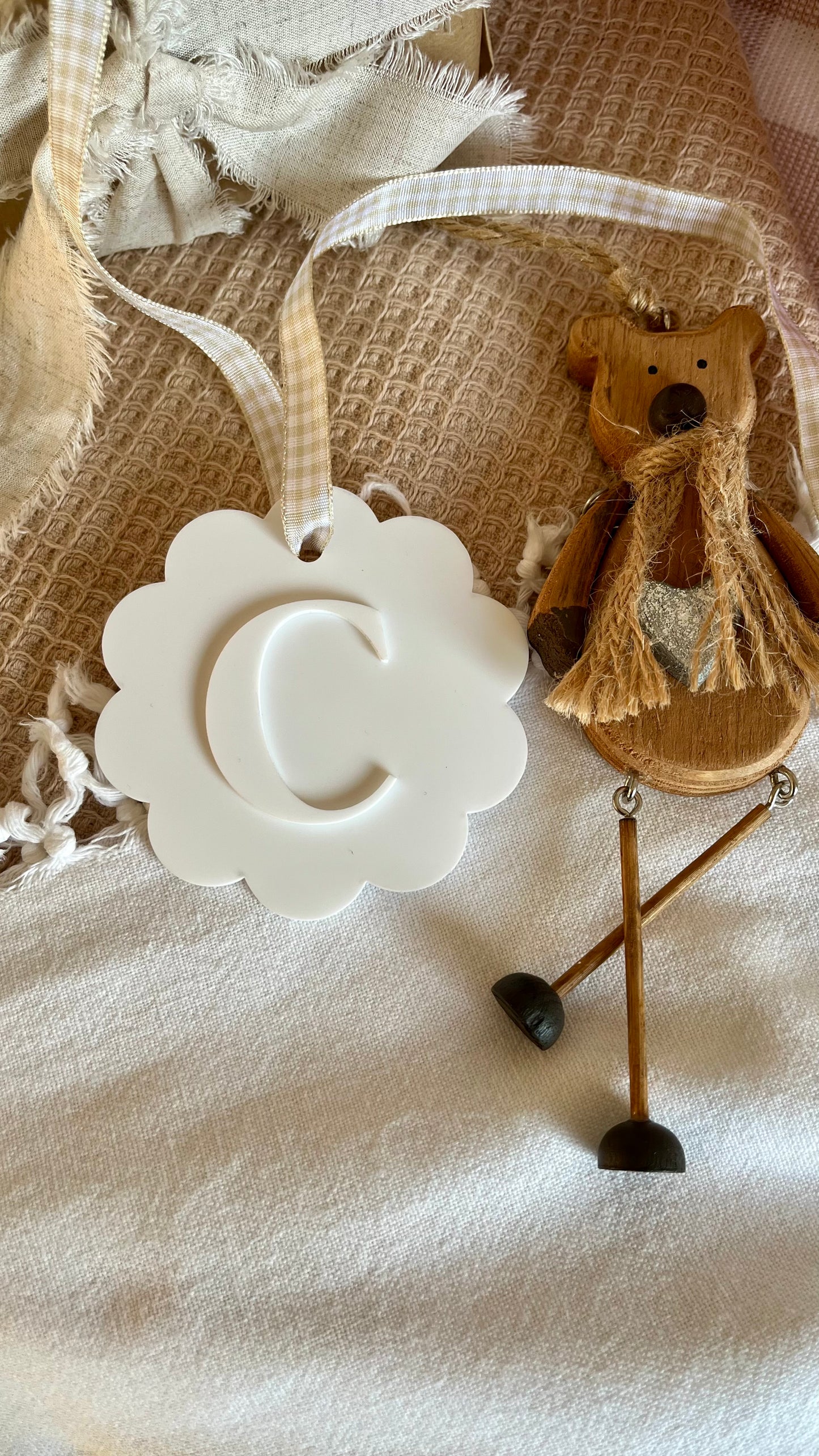 White wave with acylic initial bauble