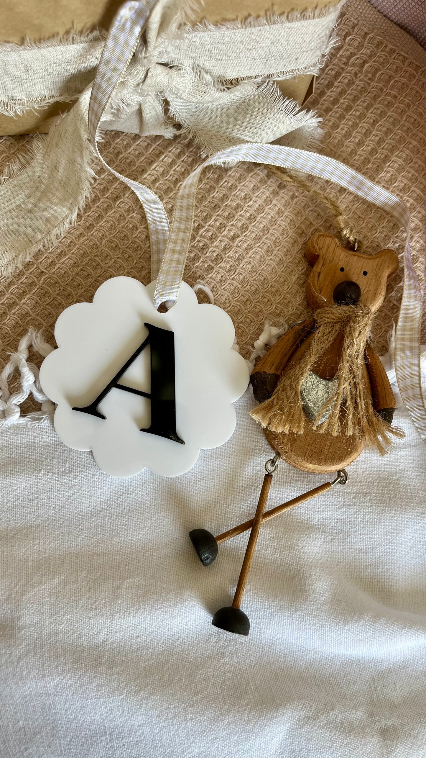White wave with acylic initial bauble