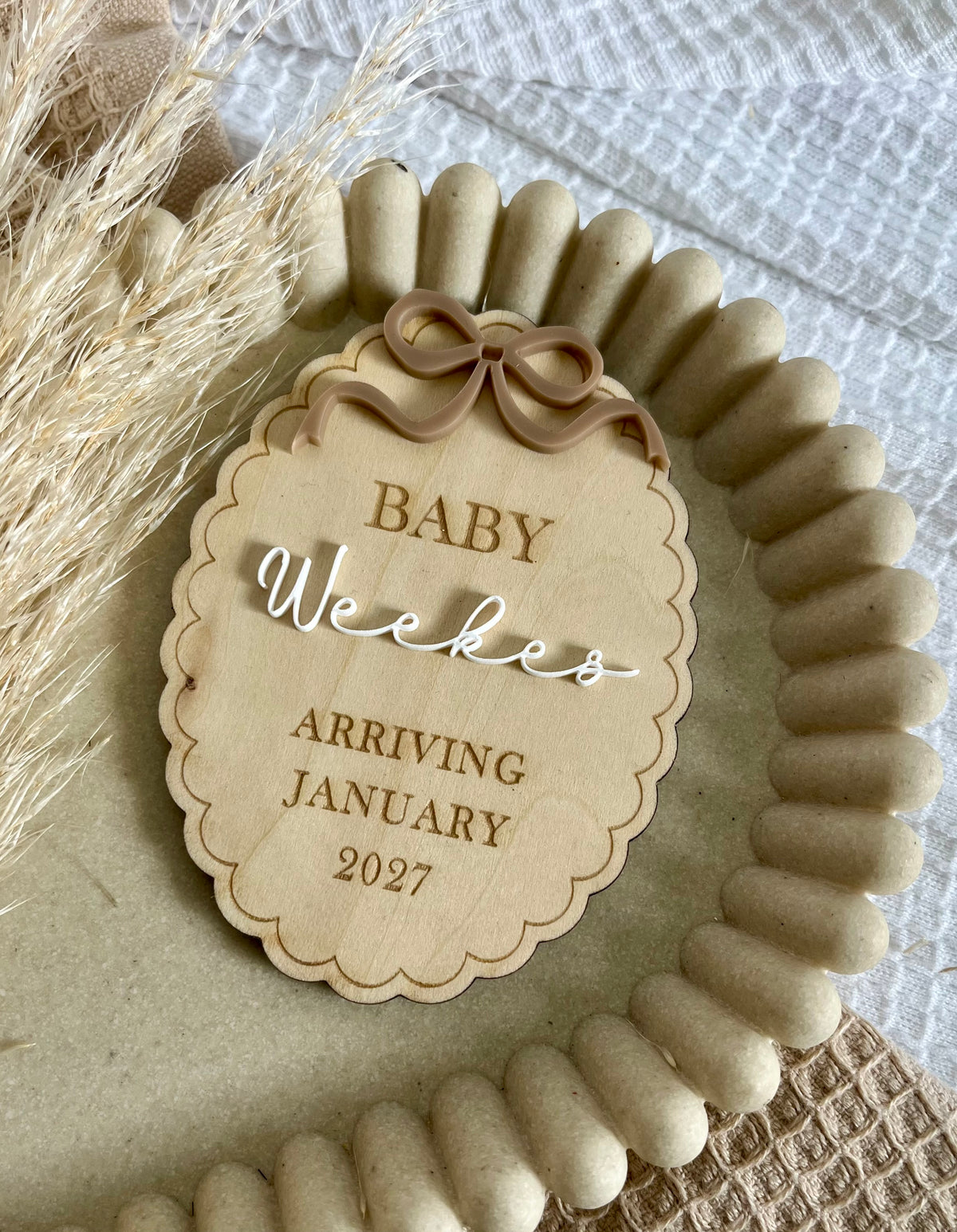 Scallop bow pregnancy announcement