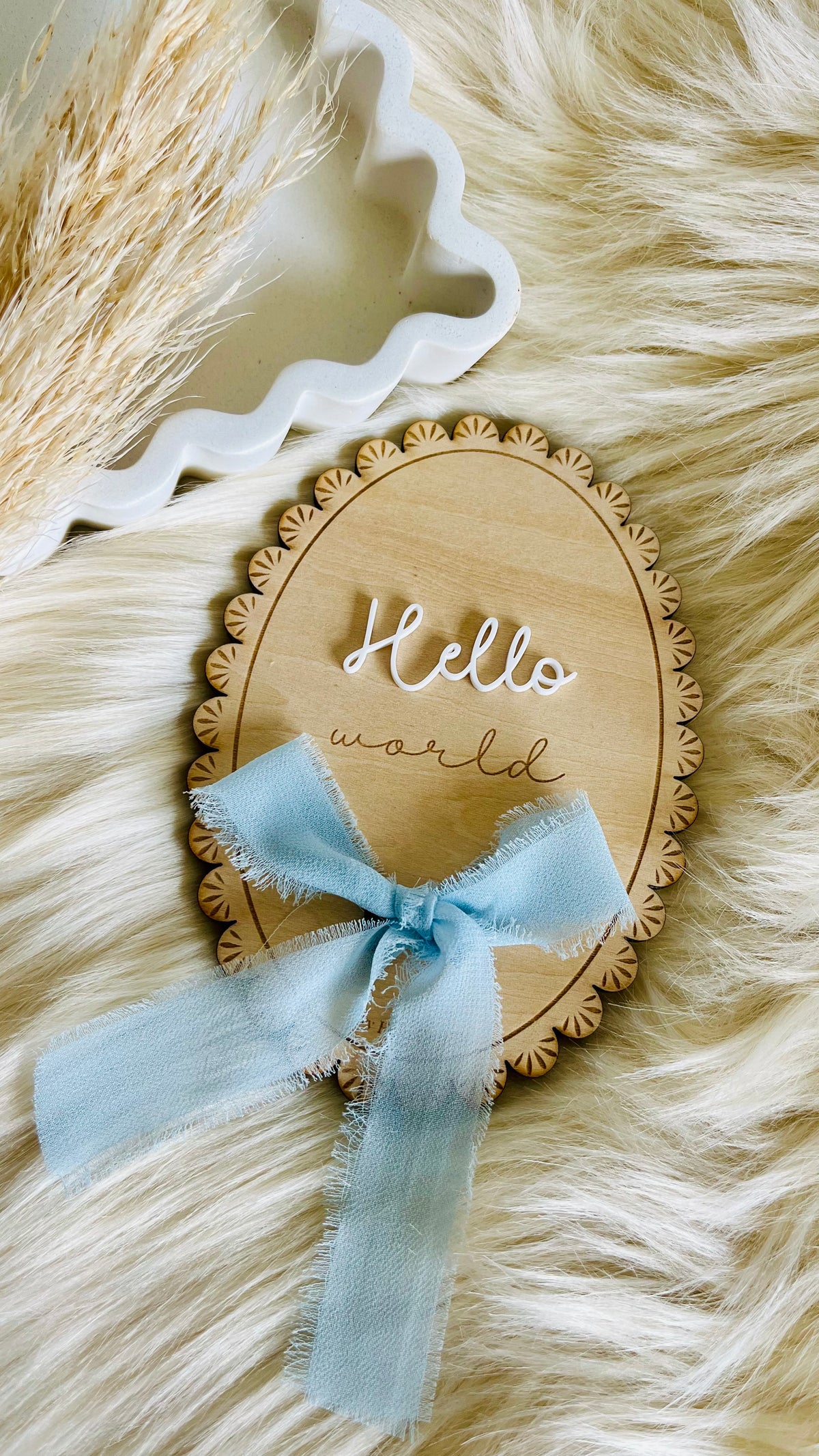 Laced oval birth announcement